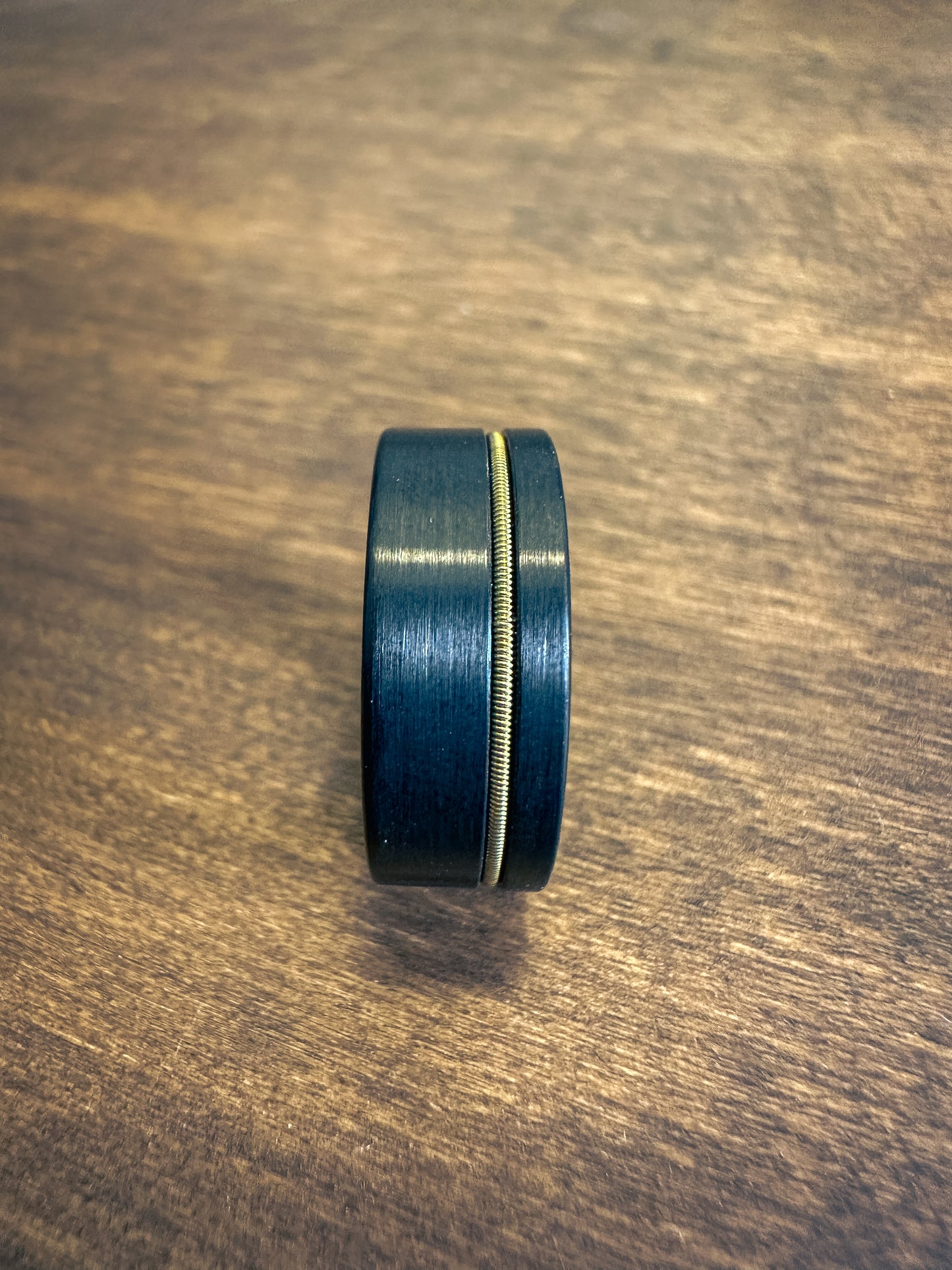 Black Ring with Guitar String Stripe