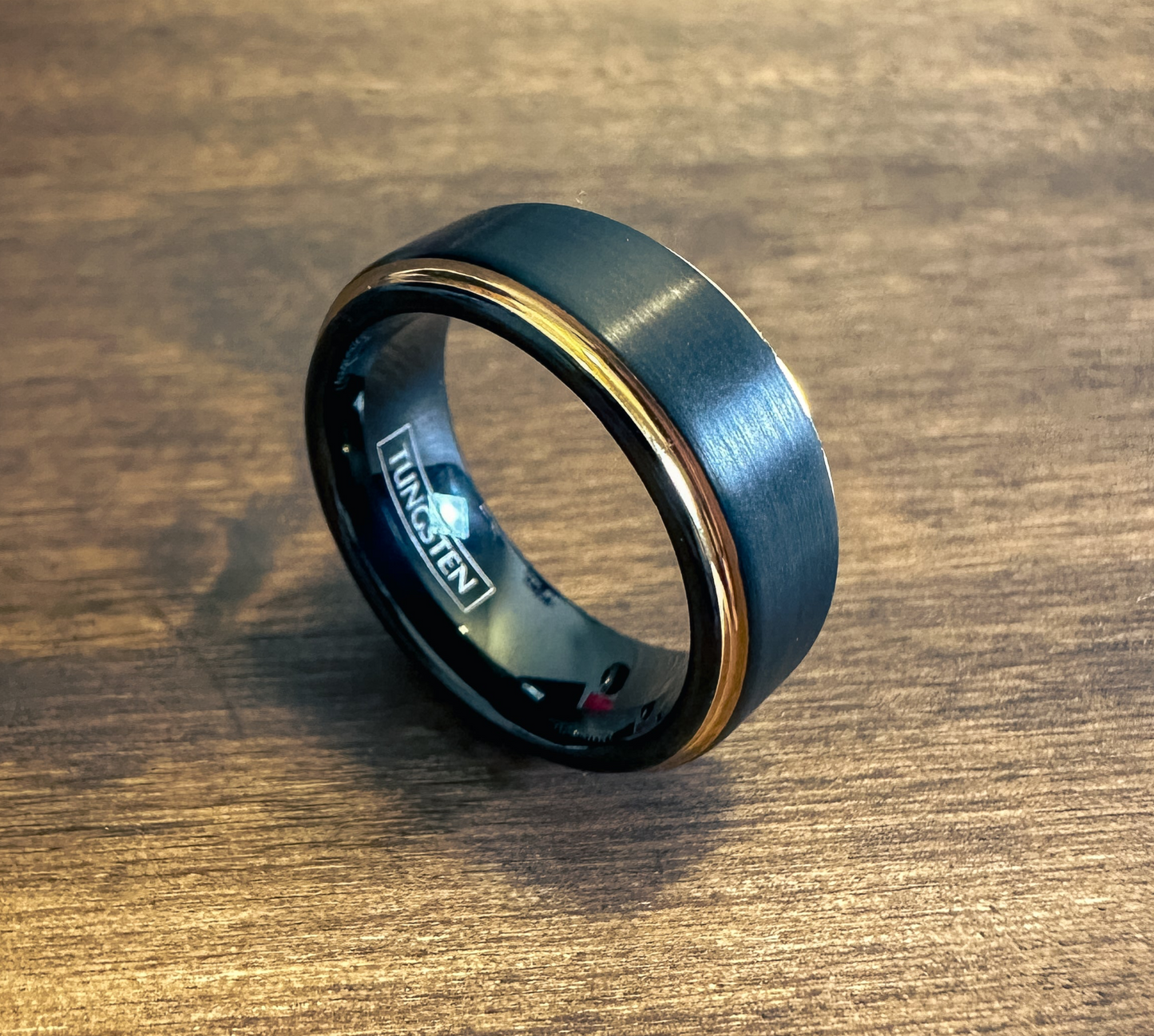 Two-Tone Black Ring With Dual Rose Gold Stripes