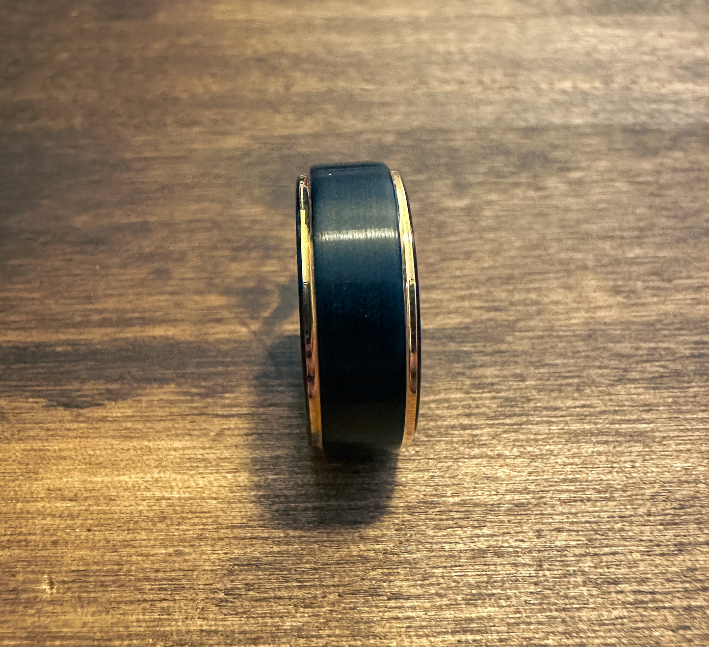 Two-Tone Black Ring With Dual Rose Gold Stripes